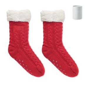 Calcetines navideños rojos personalizados con logo, ideales para regalos promocionales en eventos y campañas publicitarias.